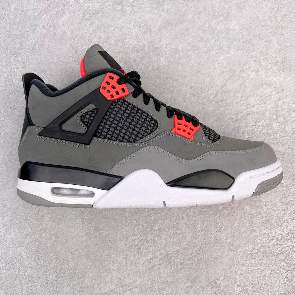 Grey and black sneakers with red accents, mesh panels, and white midsole