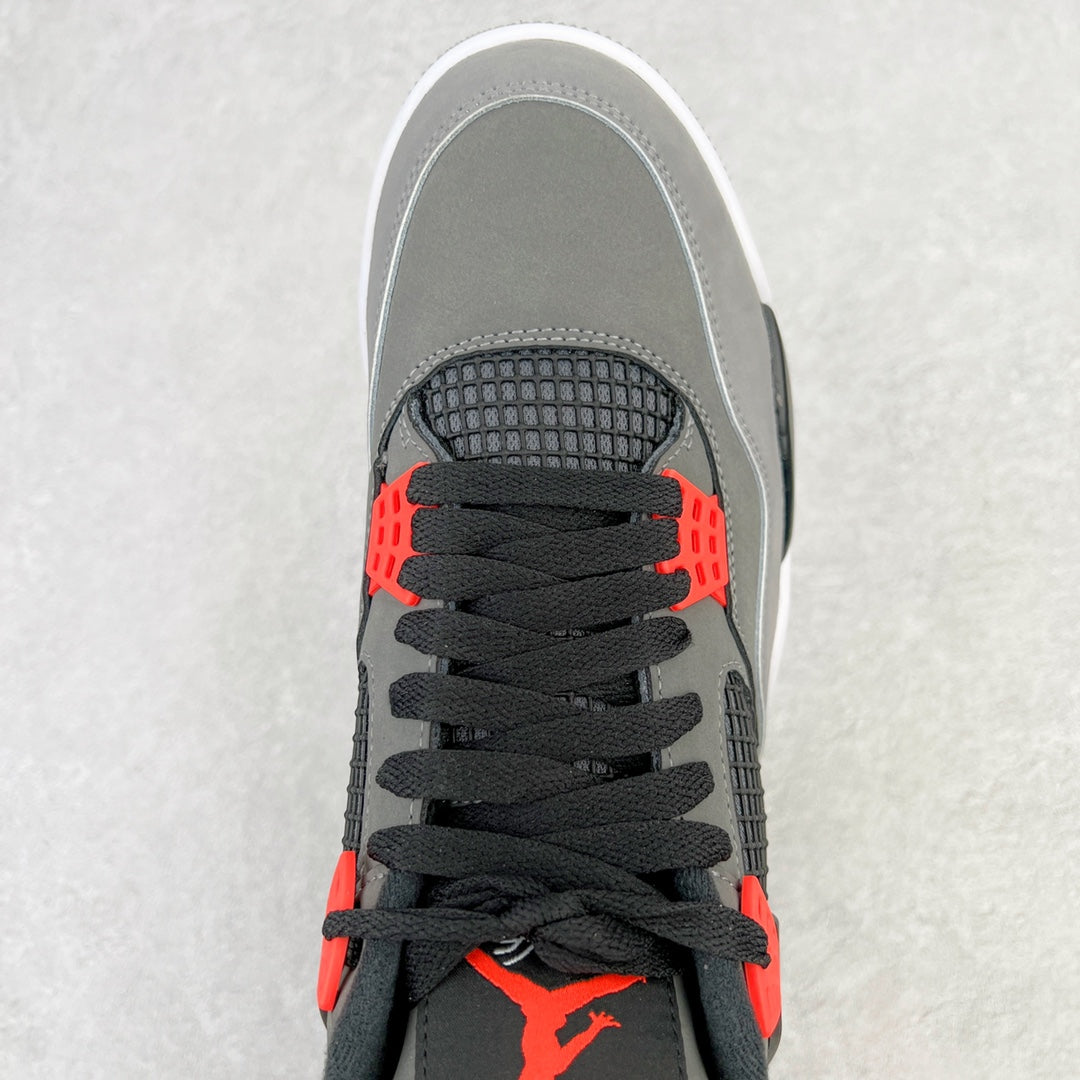 Front view of grey sneaker with black laces, red lace loops, and mesh toe panel
