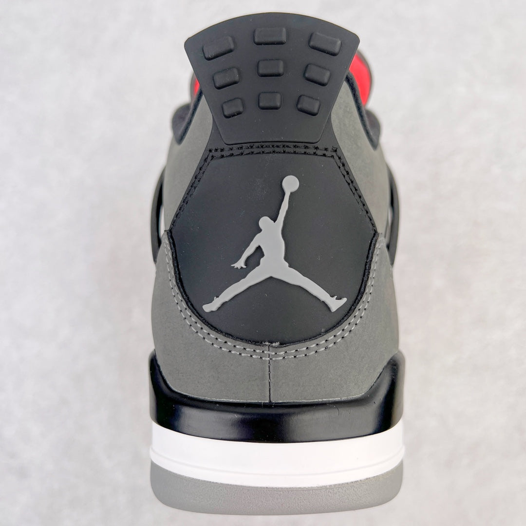 Heel of grey sneaker with black upper, white Jumpman logo, and rubber outsole
