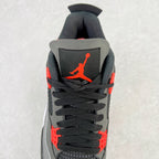 Back view sneaker with black collar, red accents, and black wing emblem