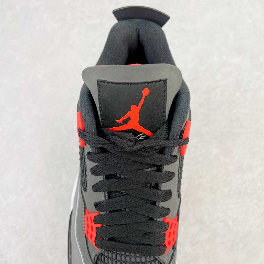 Back view sneaker with black collar, red accents, and black wing emblem