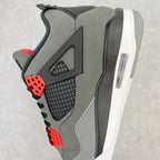 Side view grey sneaker with red lace eyelets and black mesh quarter panel