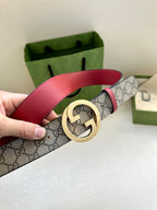 Gucci GG canvas belt with gold-tone G buckle and red leather strap