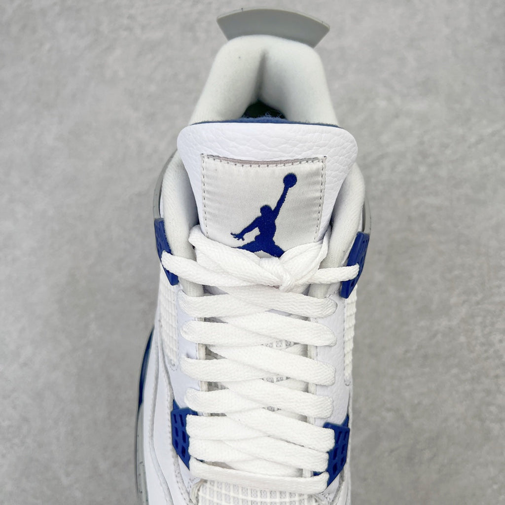 White mid-top sneaker with blue Jumpman logo on the heel and blue lace details