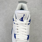White mid-top sneaker with blue Jumpman logo on the heel and blue lace details
