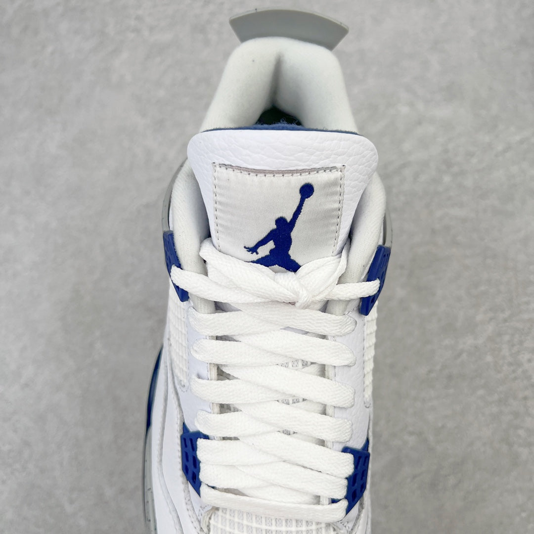 White mid-top sneaker with blue Jumpman logo on the heel and blue lace details