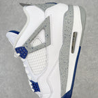 White mid-top sneaker profile with gray speckled side panel and navy heel