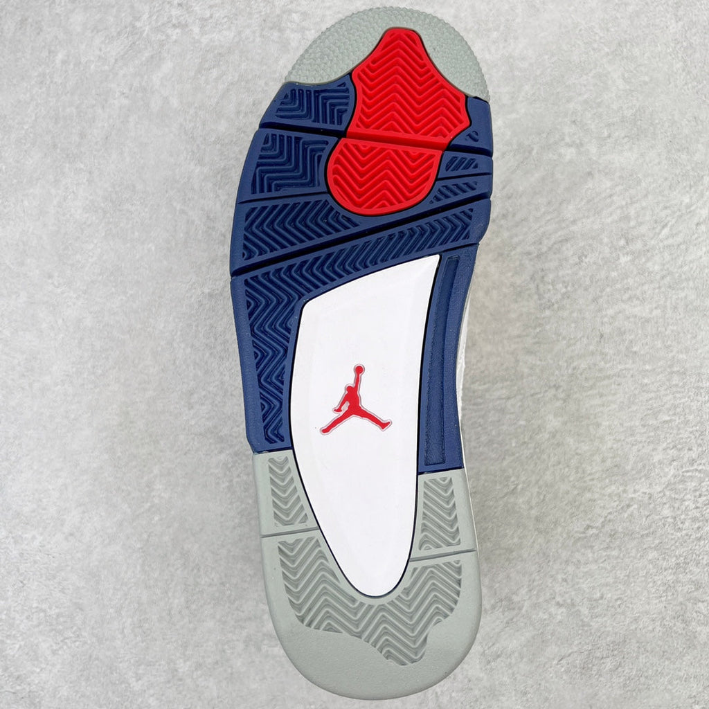 Outsole of mid-top sneakers in navy and gray with red Jumpman graphic
