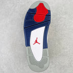 Outsole of mid-top sneakers in navy and gray with red Jumpman graphic