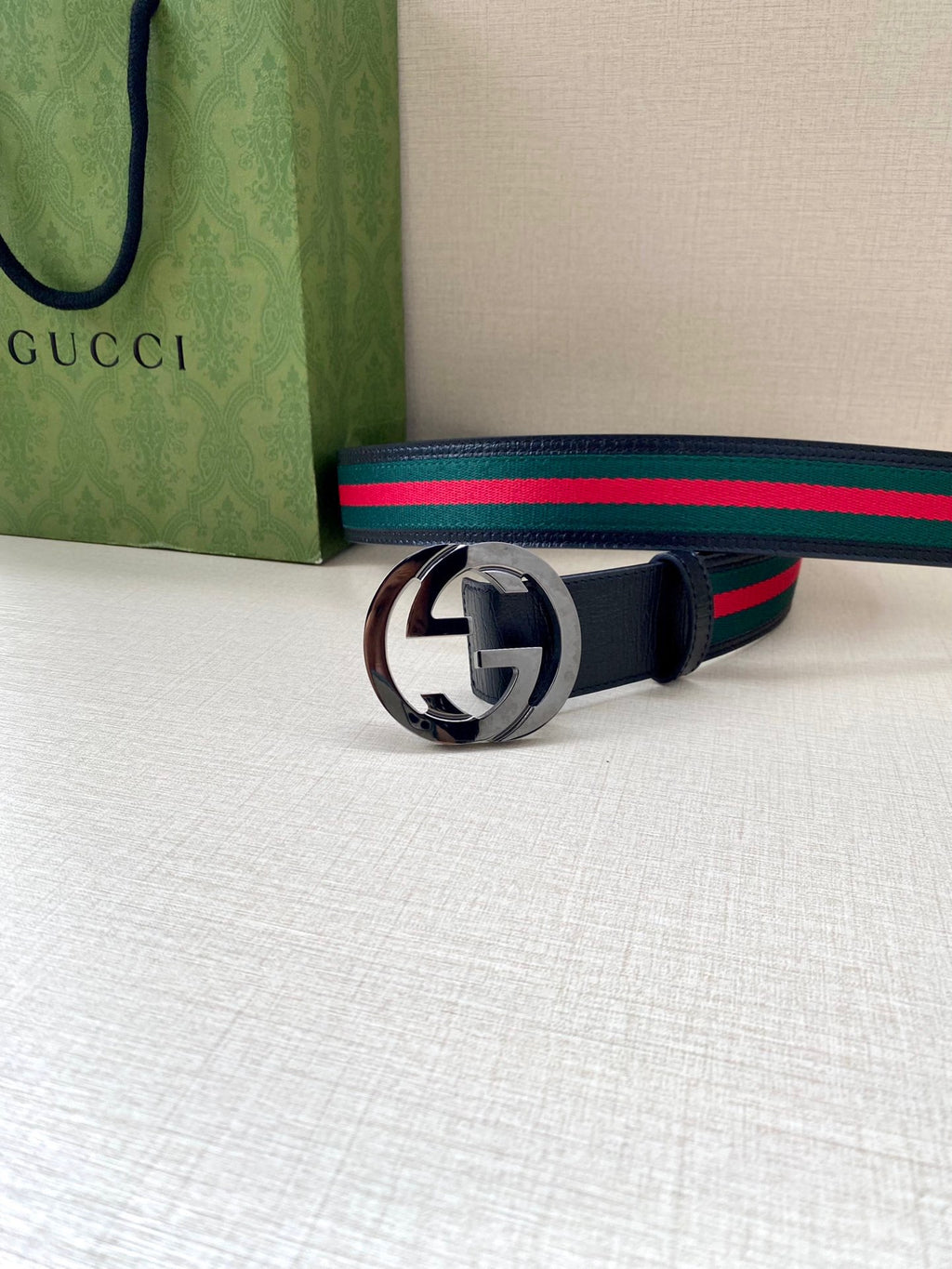 Gucci belt, navy strap with multicolor web stripe, silver double-G buckle