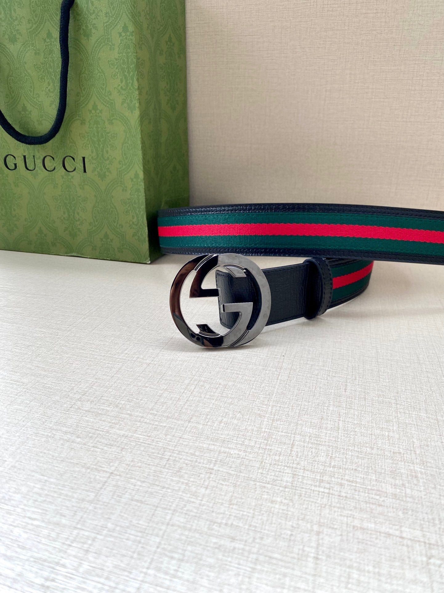 Gucci belt, navy strap with multicolor web stripe, silver double-G buckle