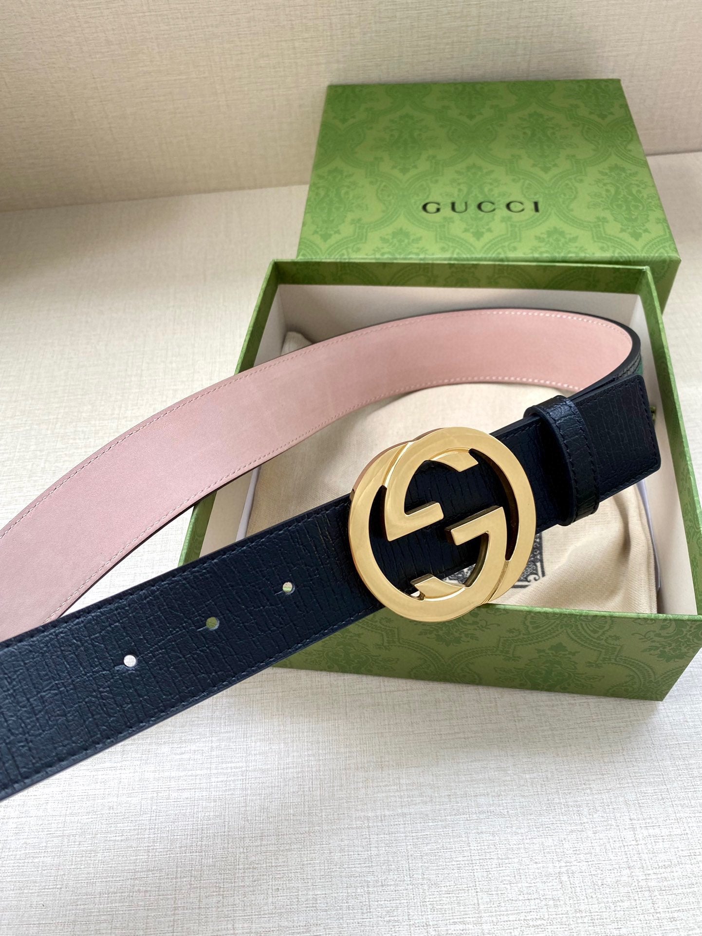 Gucci belt dark blue leather with gold-tone double-G buckle, shown with gift box.