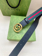 Navy leather belt with gold double-G buckle and multicolor webbing