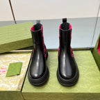 Black unisex chelsea boots with pink GG patterned panels and elastic pull tabs