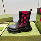 Black unisex chelsea boot with pink GG logo patterned side panels and pull-tab collar