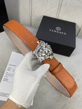 Orange leather belt with silver-toned Medusa buckle and tan keeper strap