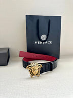 Black leather belt with red inner stripe and gold Medusa buckle