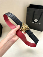Black leather belt with red lining and gold Medusa buckle