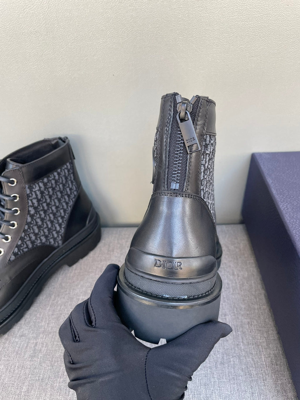 Mid-height Dior lace-up boots with monogram panels and thick platform sole