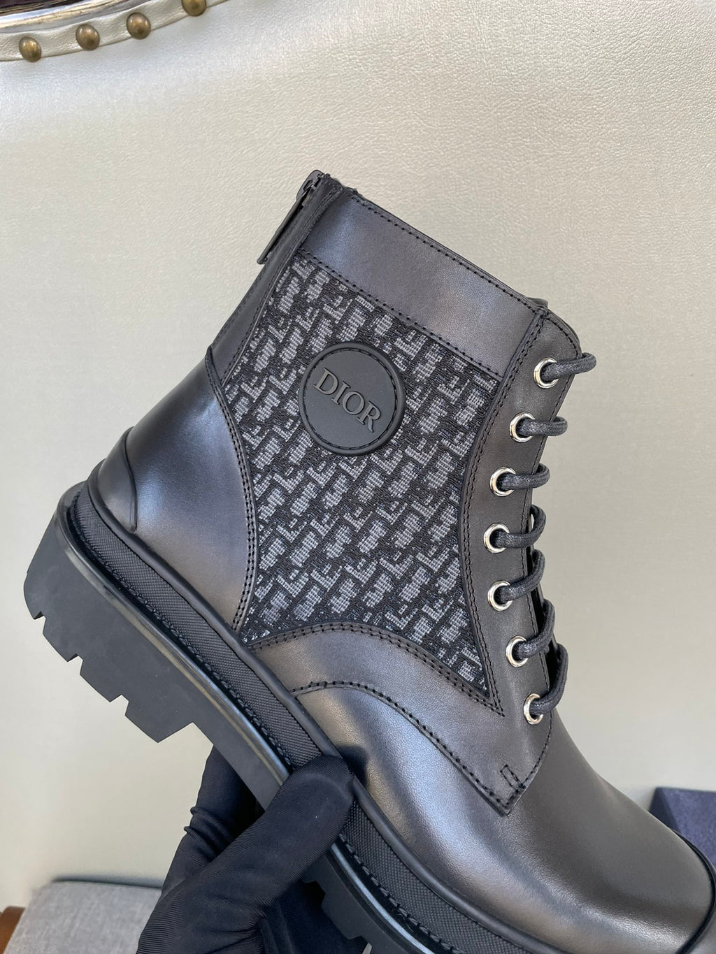 Dark Dior lace-up ankle boots with monogram panel and lace-up front, lug sole