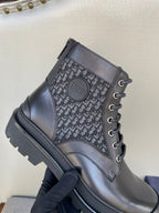 Dark Dior lace-up ankle boots with monogram panel and lace-up front, lug sole