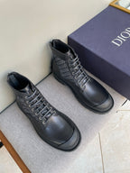 Dark leather lace-up boots with Dior monogram pattern panel and chunky lug sole