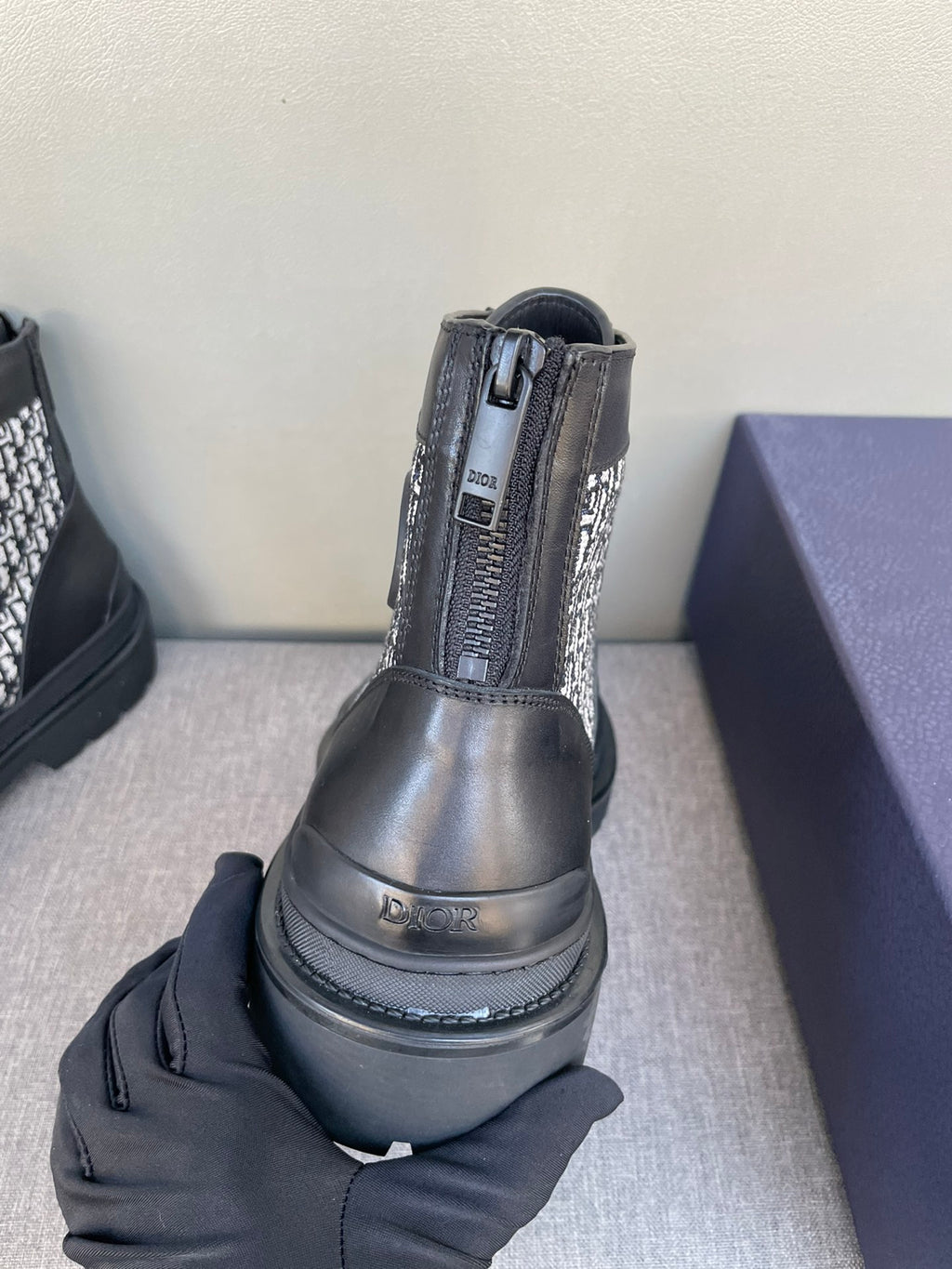 Dior lace-up ankle boot heel view, black leather with monogram side panel