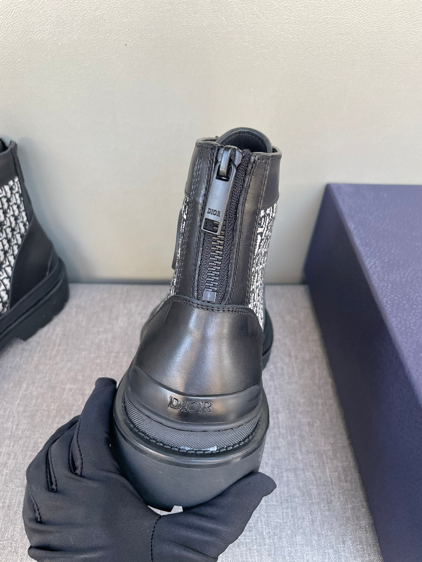 Dior lace-up ankle boot heel view, black leather with monogram side panel