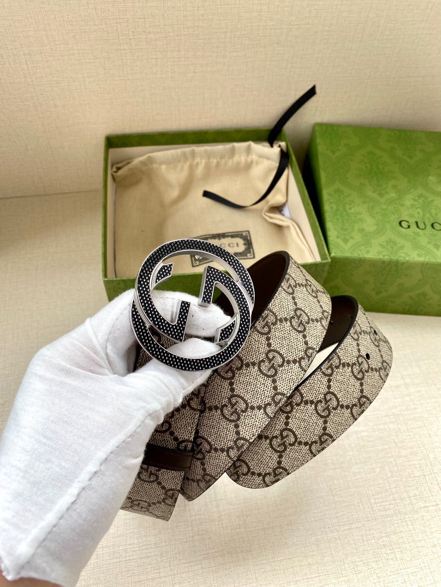 Gucci belt with GG monogram strap and large interlocking G buckle detail