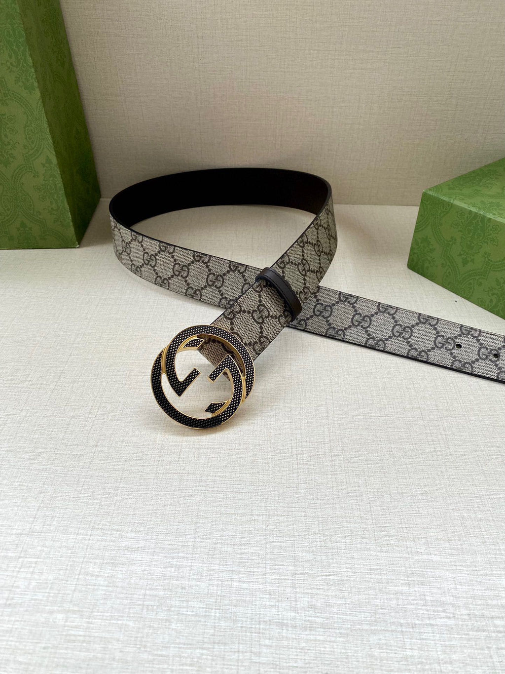 Gucci belt with GG monogram strap and interlocking G buckle with dark finish