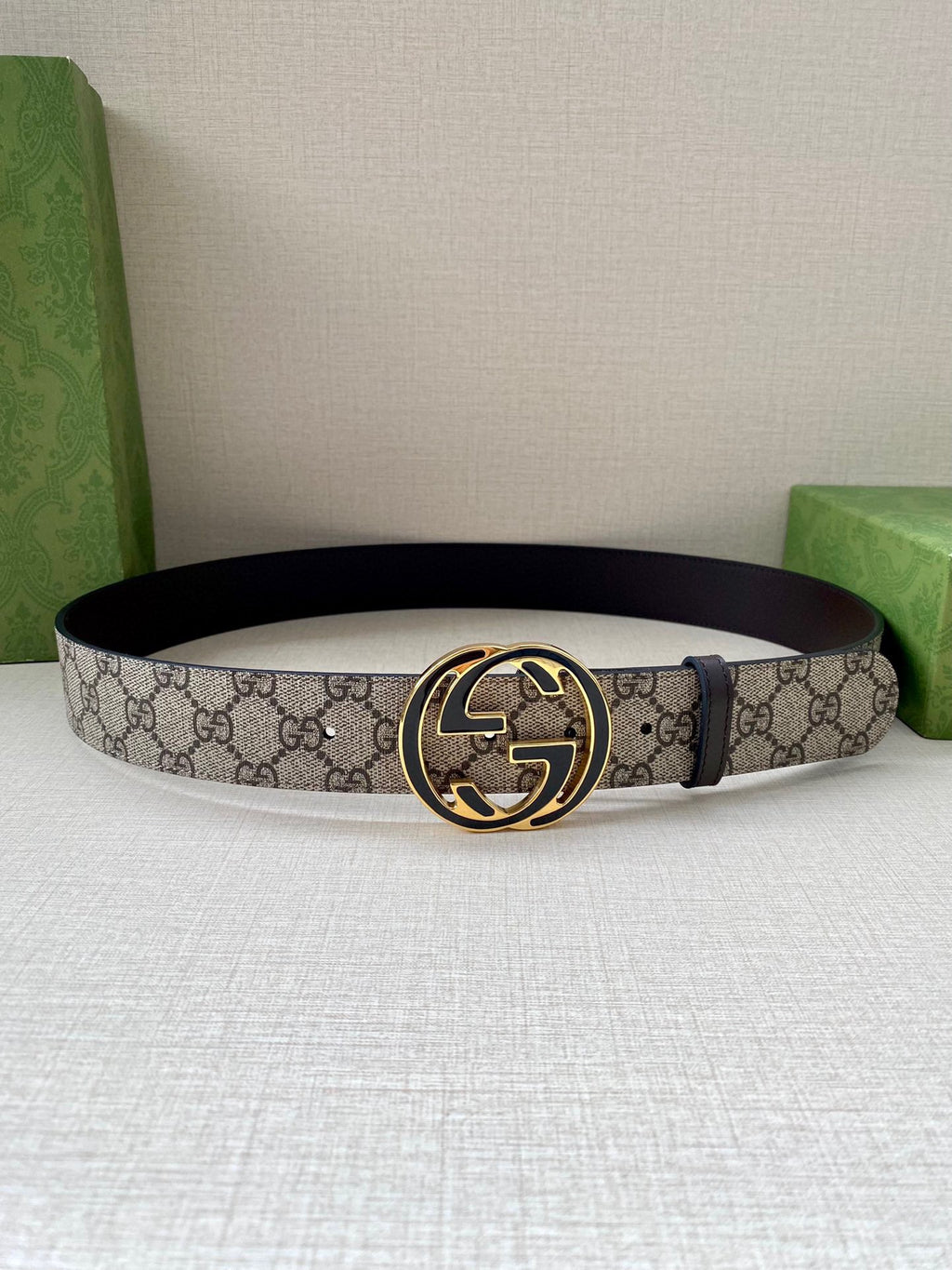 Gucci belt with GG monogram canvas and dark leather edge, oval logo buckle