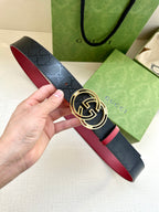 Gucci logo leather belt with round GG buckle, dark navy and red trim