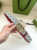 Gucci belt with blue GG canvas strap and gold-tone double-G buckle