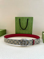 Gucci belt with blue GG canvas and red lining, silver-tone double-G buckle