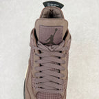 Jordan 4 retro sneaker tongue view with lace-up front and Jordan logo patch