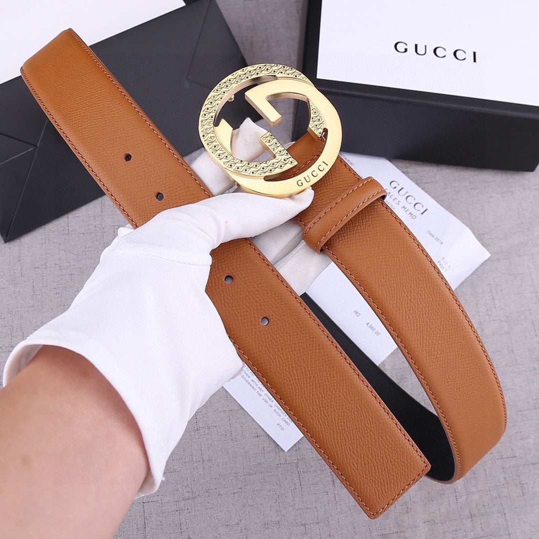 Gucci belt in tan leather with round gold-tone GG buckle and stitched strap