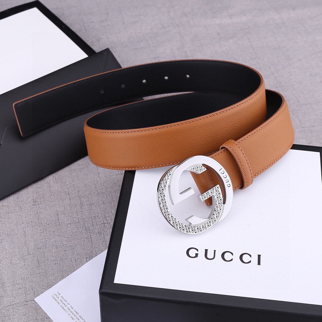 Gucci tan leather belt with round silver GG buckle and keeper strap