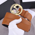 Gucci tan leather belt with wide strap and gold-tone round GG buckle