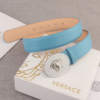 Light blue leather belt with round silver-tone medallion buckle and prong holes