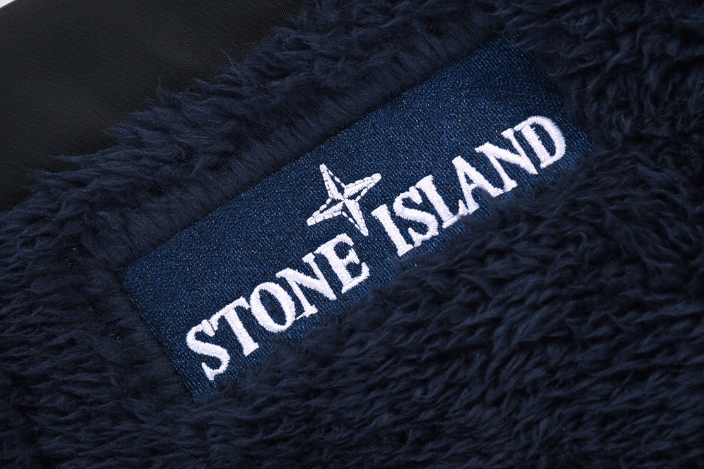 Navy fleece jacket with Stone Island logo label