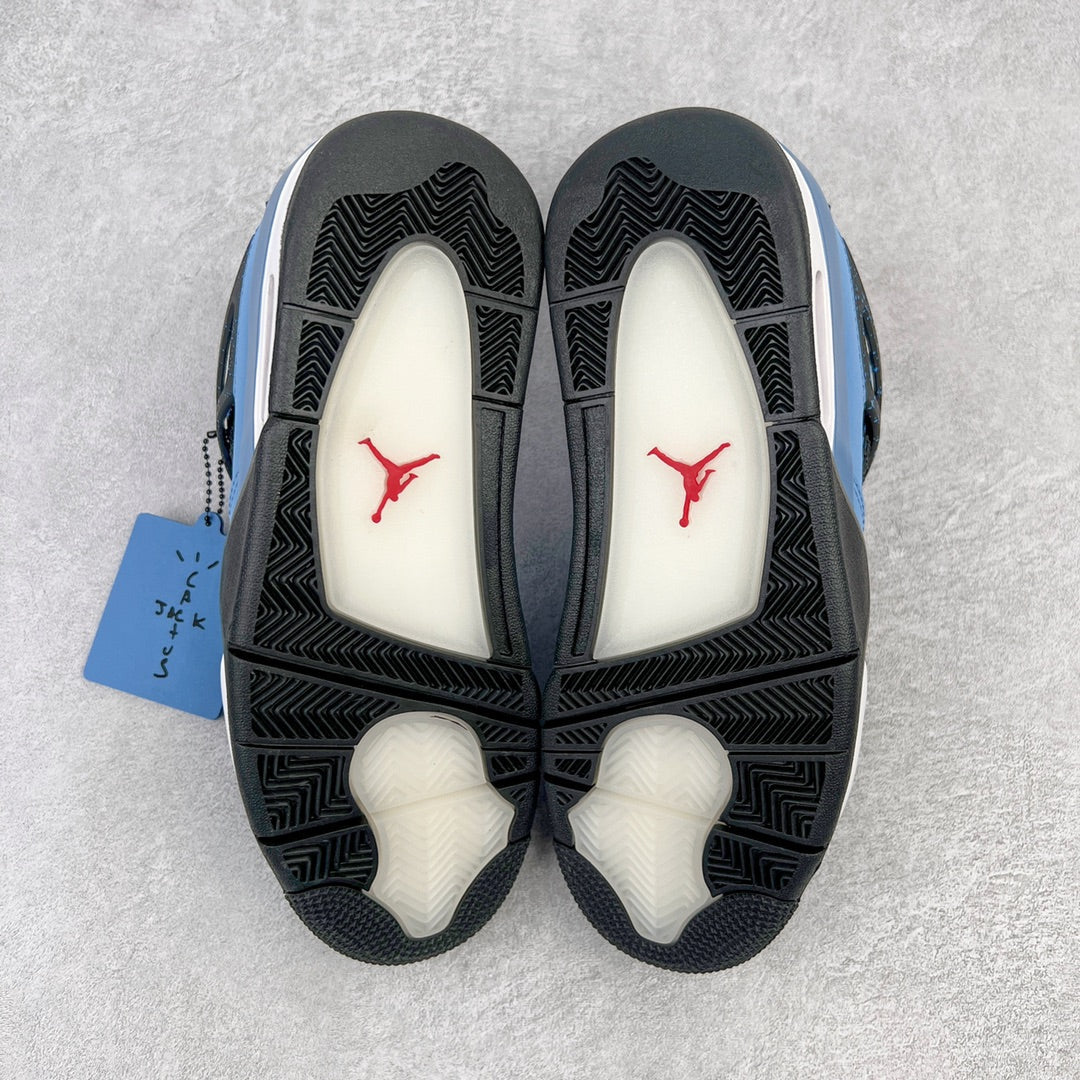 Outsole view of light blue sneakers with black rubber tread and red Jumpman logo