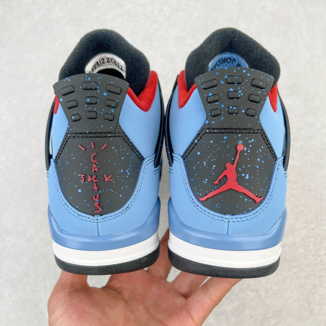 Back view of light blue sneakers with black heel panels, red Jumpman mark, dark outsole