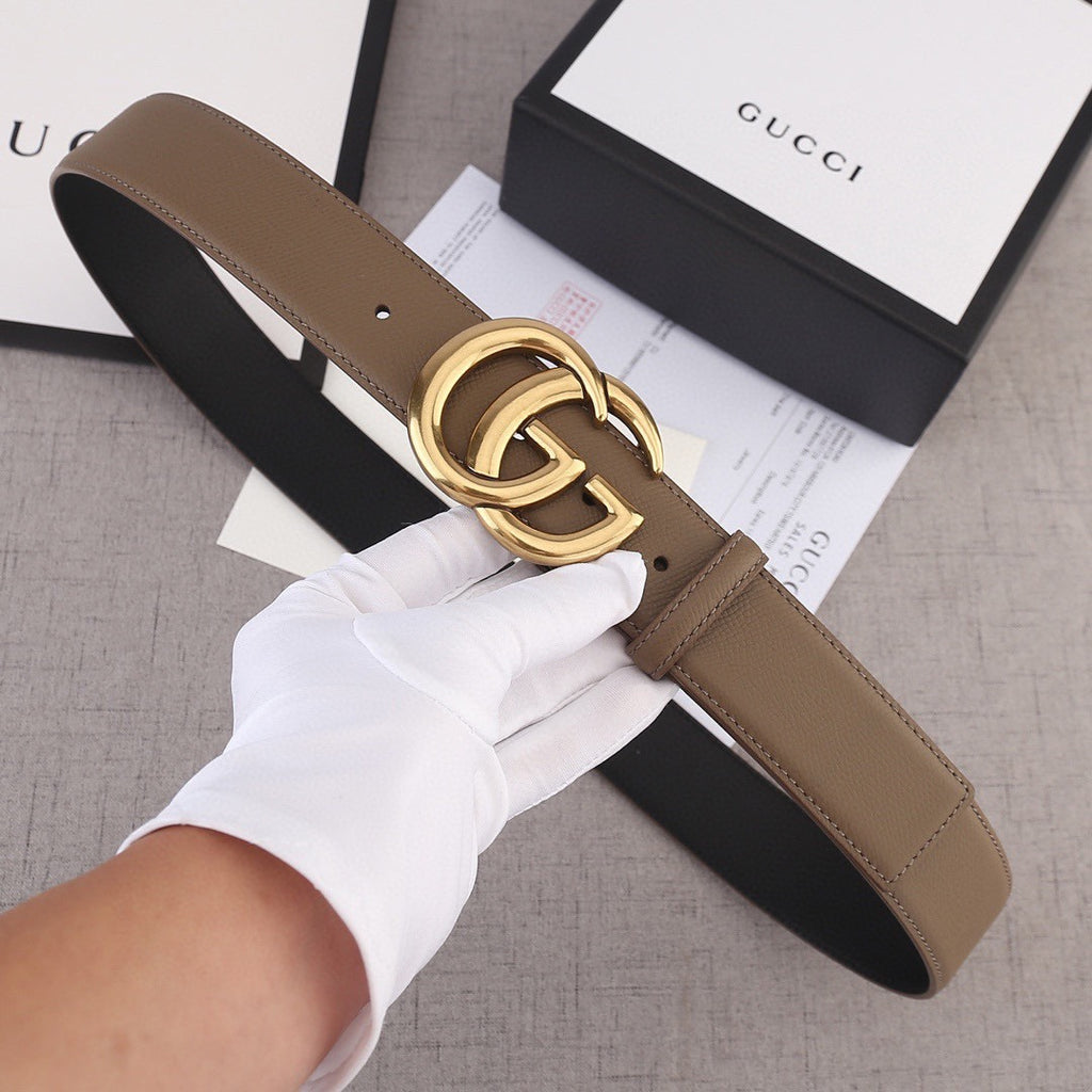 Brown leather belt with gold-tone GG buckle and stitched keeper