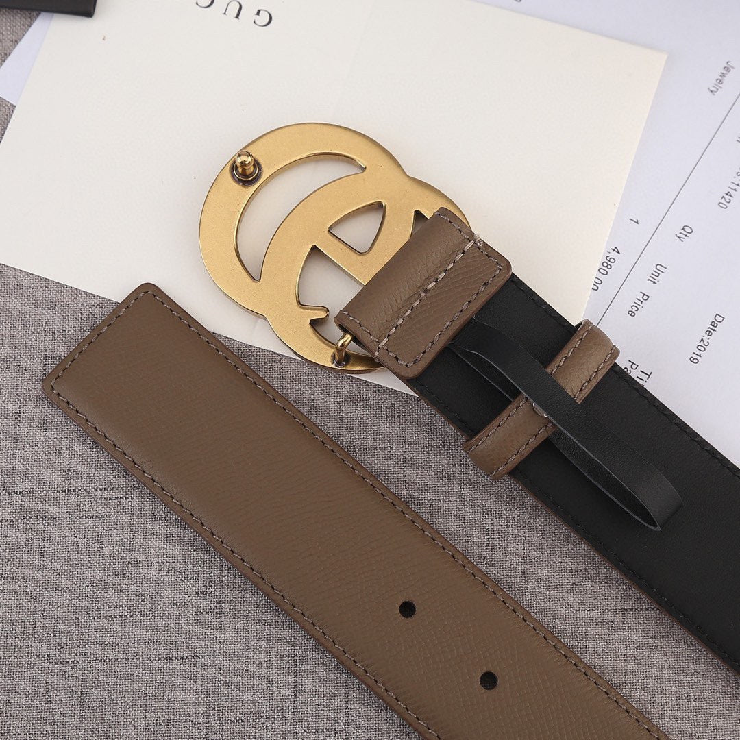 Brown leather belt with gold-tone buckle and two strap lengths with holes