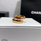Chanel accessories stacked ring: gold band with geometric pattern and diamond accents