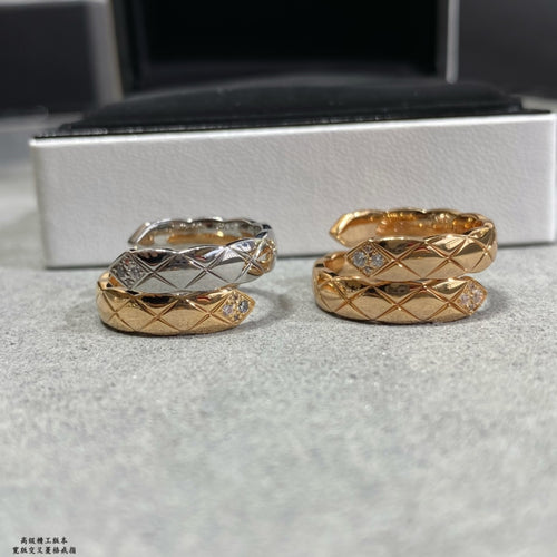 Chanel accessories ring set: two stacked gold and silver bands with diamond accents