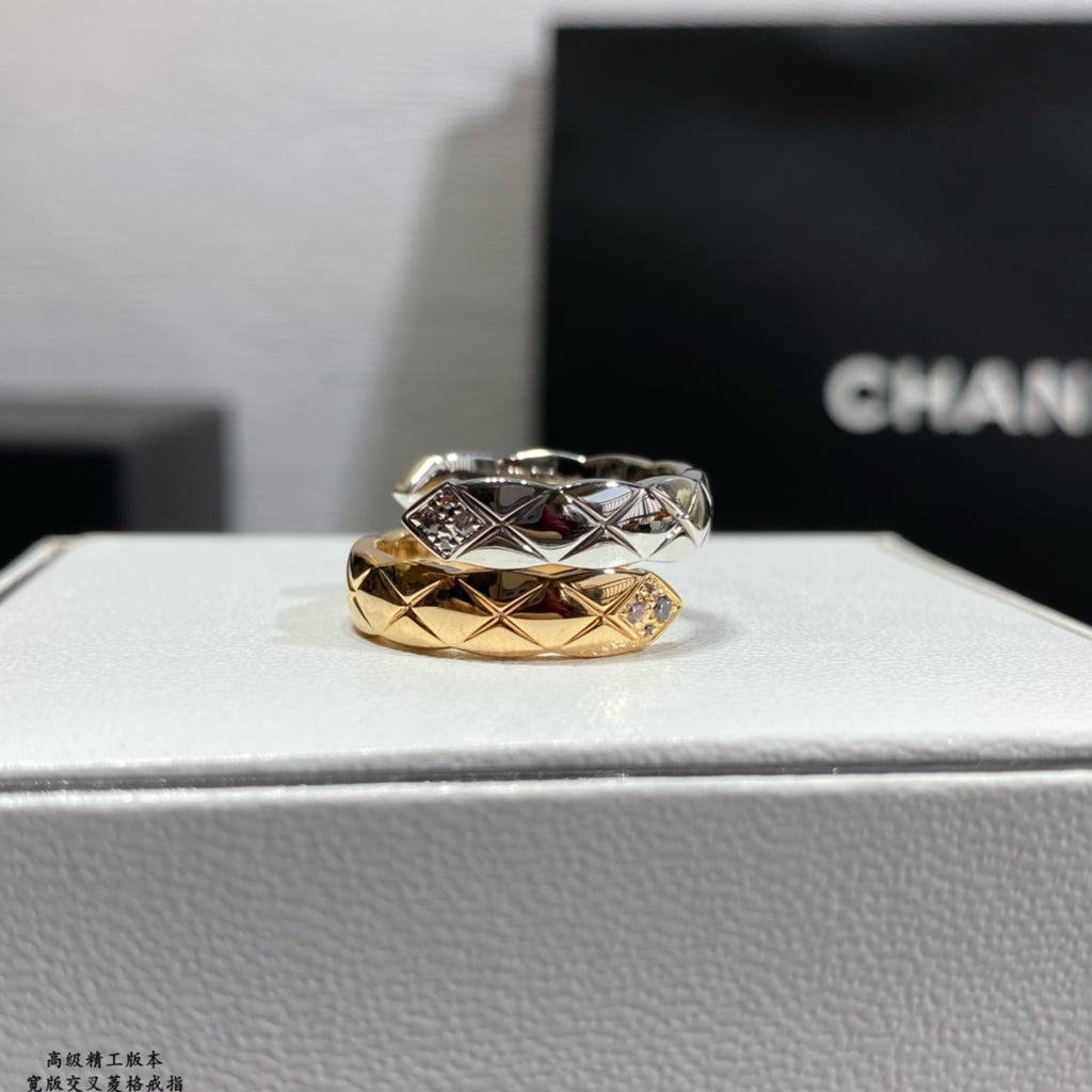 Chanel accessories stacked ring: gold-and-silver band with geometric pattern and diamond accents