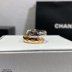 Chanel accessories stacked ring: gold-and-silver band with geometric pattern and diamond accents
