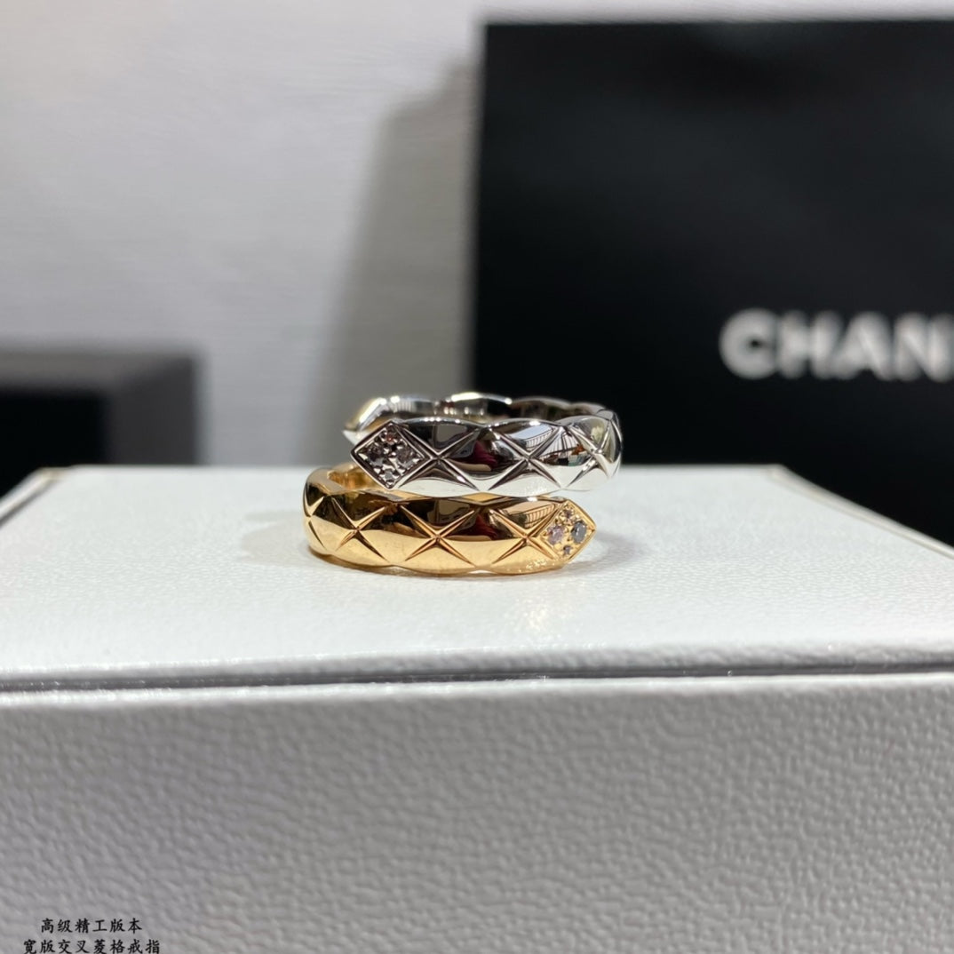 Chanel accessories stacked ring: gold-and-silver band with geometric pattern and diamond accents