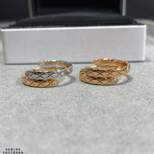 Gold-tone ring set of two with crisscross lattice and clear stone accents